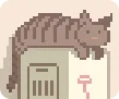Light brown tabby cat stretched out on top of a bathroom door frame